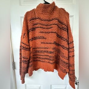 Orange turtleneck